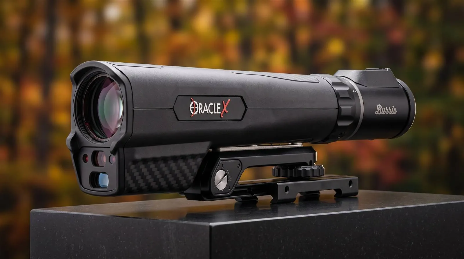 Burris Oracle X rangefinding crossbow scope on a shooting bench with its laser module and remote switch visible