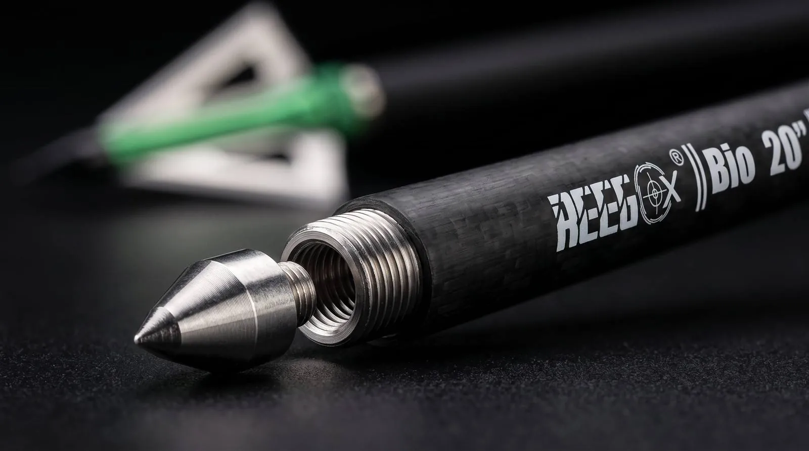 Close-up of a removable target point being threaded onto the front end of a REEGOX bolt shaft