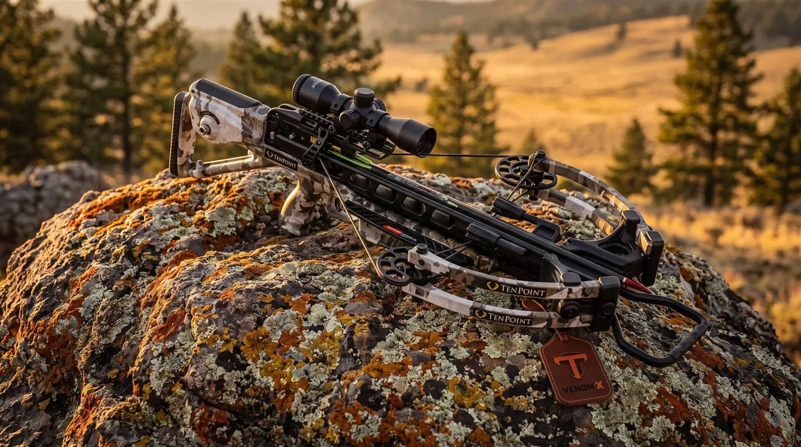 Lightweight camo crossbow resting in a backcountry setting at golden hour with warm light